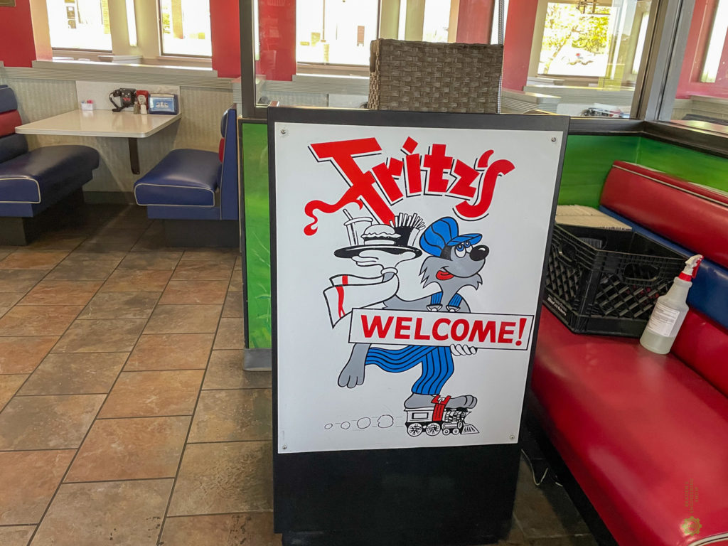 Fritz's hostess stand with Welcome Sign